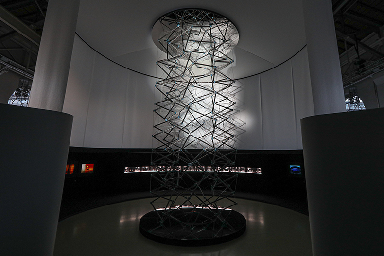 Caption: Tencylinder, a tensegrity structure designed by artist Clément Vieille, Filippo Broggini and Felix Stampfli as architects, and Rhode-Barbarigos as engineer along with Ingphi Sa as part of the 2020 Watches and Wonders trade show for the launch of a new line of Hermès watches. Photo courtesy of Allain Herzog/Hermès.