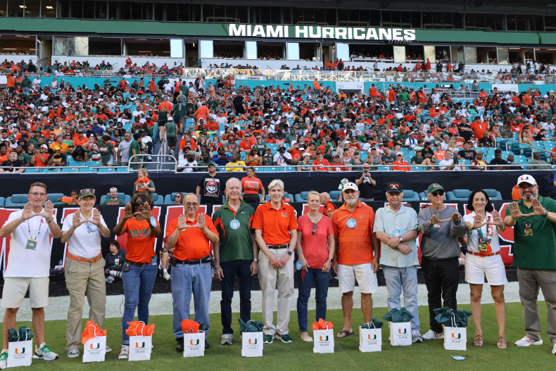 Faculty and staff members honored during football game