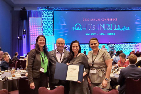 Office of Engagement—part of the Division of Development and Alumni Relations—accepted an award certificate at the Loews Sapphire Hotel in Orlando on Tuesday, Feb. 11, for their Meet the CEO program.