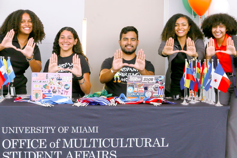 From left, Stephanie Nuñez, Adriana Ramirez, David Raez, Kennedy Robinson, and Taylor Castro are photographed at the Hispanic Heritage Month opening ceremony on Friday, Sept. 16. Photo: Catherine Mairena/University of Miami Division of Student Affairs