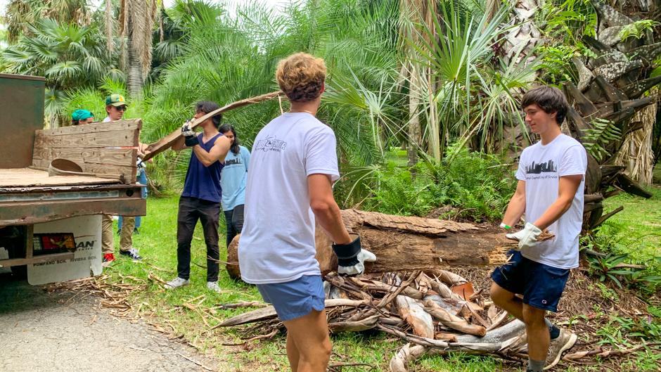 At the Montgomery Botanical Center, a nonprofit in Coral Gables, students cleared debris from fallen foliage.