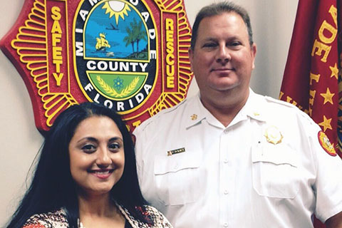 Amishi Jha and Dave Downey, Miami-Dade Fire Chief.