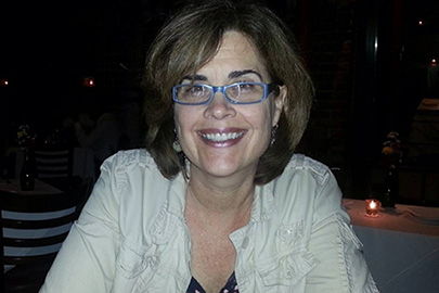 Sallie Hughes, an associate professor in UM’s School of Communication
