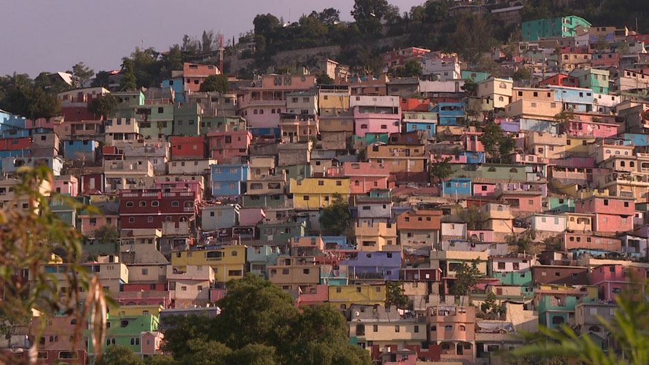 Freshly painted hillside homes in Haiti