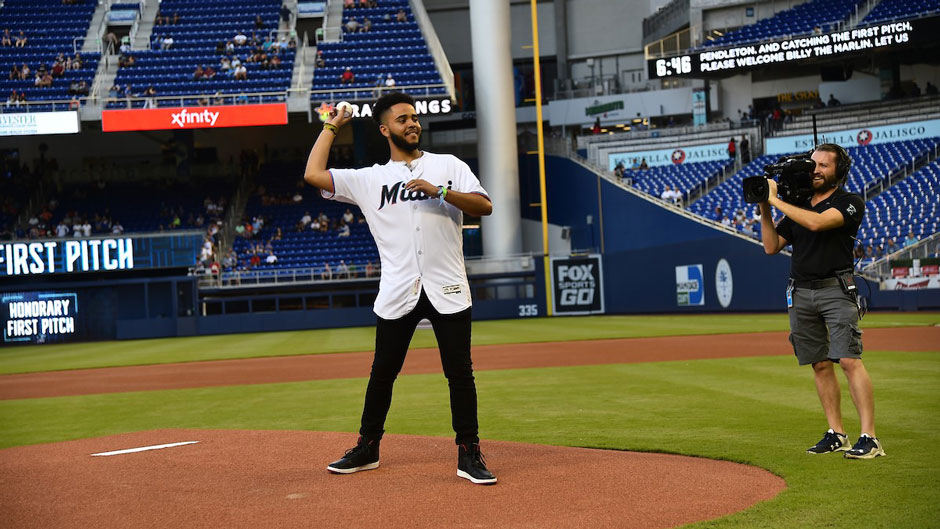 Miles Pendleton throwing first pitch at Miami Marlines game.