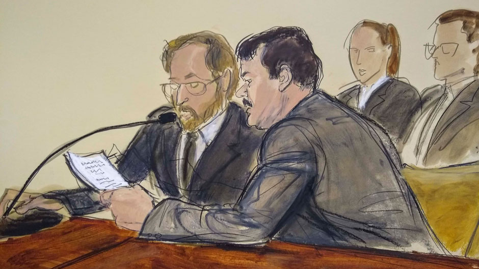In this courtroom sketch, Joaquin "El Chapo" Guzman, foreground right, reads a statement through an interpreter during his sentencing in federal court, Wednesday, July 17, 2019, in New York. The Mexican drug kingpin, who was convicted in February 2019 on multiple conspiracy counts in an epic drug-trafficking case, was sentenced to life behind bars in a U.S. prison Wednesday. (Elizabeth Williams via AP)