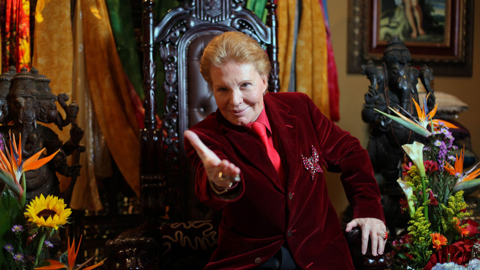 Puerto Rican astrologer Walter Mercado, also known as Shanti Ananda, poses for the camera during a press conference in San Juan, Puerto Rico, Tuesday, Feb. 14, 2012. The famed astrologer who has emerged from a near-death experience due to heart problems has announced that he will create a charitable foundation to help those in need. (AP Photo/Dennis M. Rivera Pichardo)