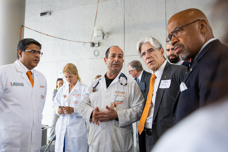 University of Miami President Julio Frenk (second from right) visited UHealth Tower earlier this week to learn more about how the University of Miami Health System is implementing measures to slow the spread of the novel coronavirus.