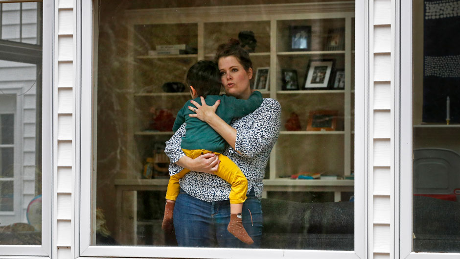 The wife and son of a doctor in Maine who works in an urgent care clinic decided to isolate from each other during the pandemic. Photo: Associated Press