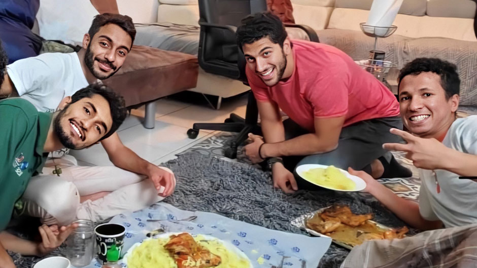 Al Mahdi Bokhait, Ahmed Alissa, Ahmed Nijem, and Hussein Alkathiri break fast during Ramadan.