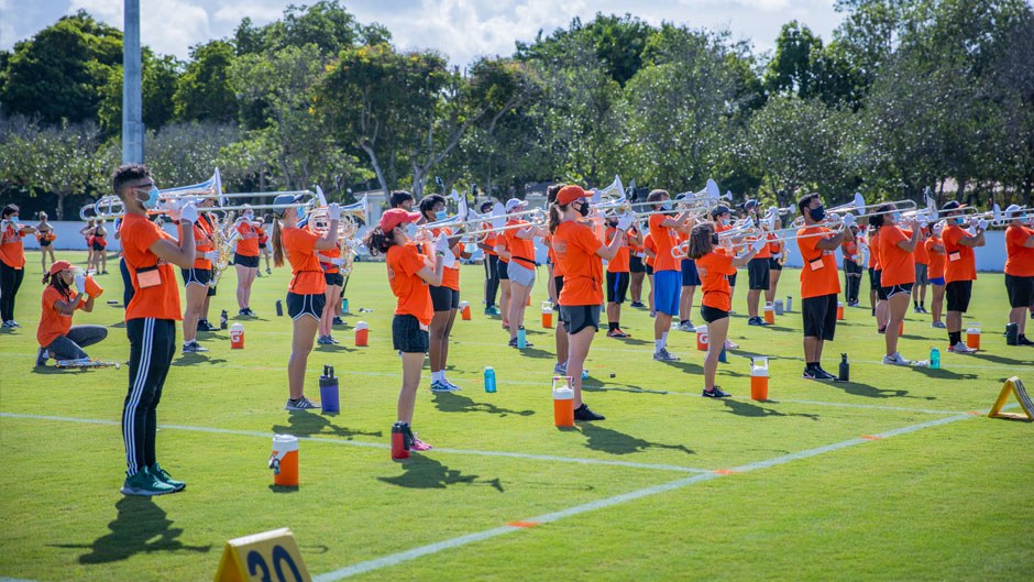 Frost Band of the Hour practices on the intramural fields