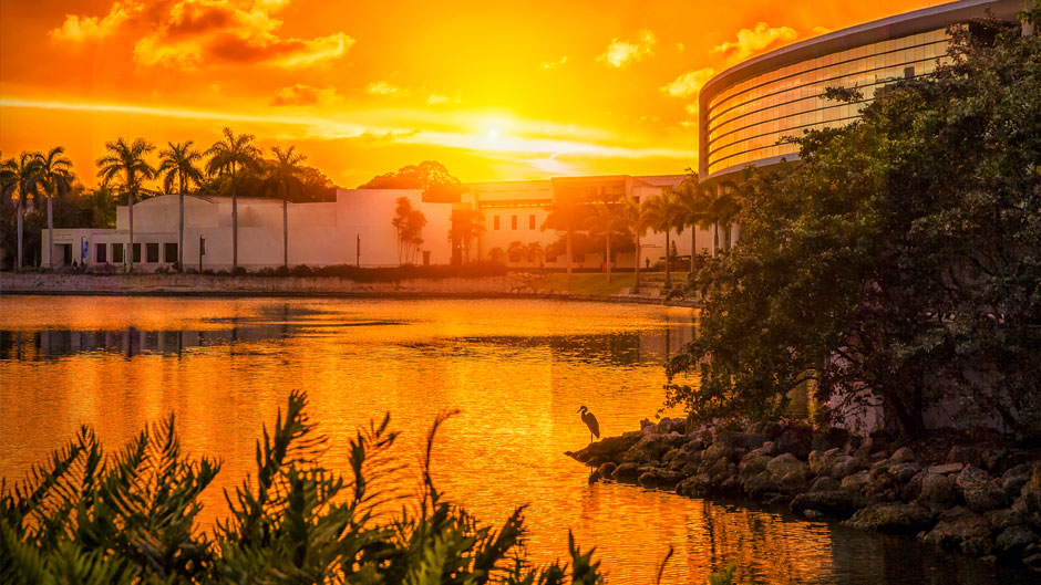 The sun sets over Lake Osceola on the Coral Gables Campus