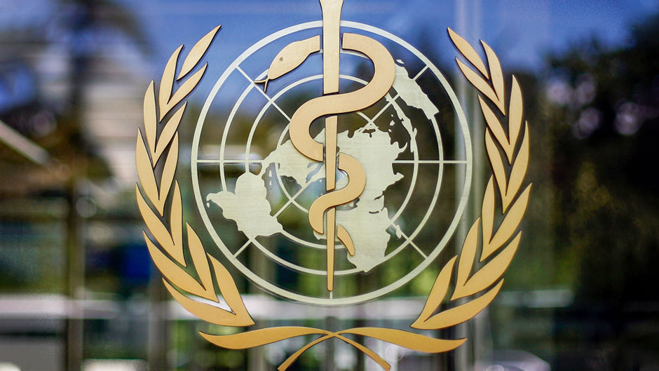 The logo of the World Health Organization is seen at the WHO headquarters in Geneva, Switzerland. 