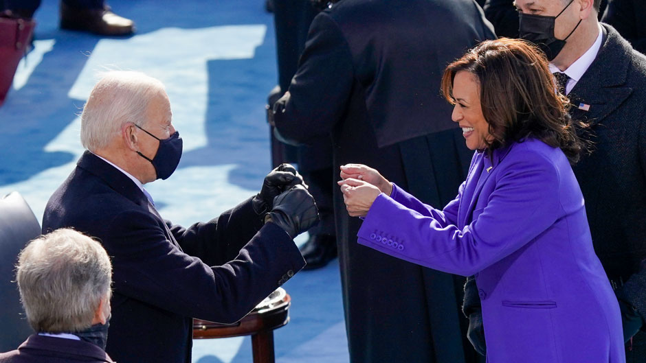 President-elect Joe Biden congratulates Vice President Kamala Harris after she was sworn in during the 59th Presidential Inauguration at the U.S. Capitol in Washington, Wednesday, Jan. 20, 2021. (AP Photo/Carolyn Kaster)
