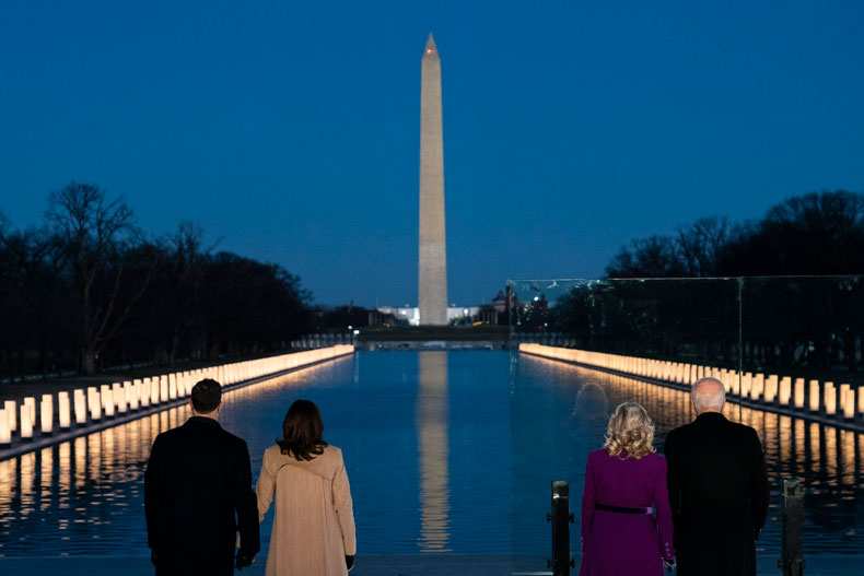 President-elect Joe Biden and his wife Jill Biden are joined by Vice President-elect Kamala Harris and her husband Doug Emhoff during a COVID-19 memorial event at the Lincoln Memorial Reflecting Pool, Tuesday, Jan. 19, 2021, in Washington. (AP Photo/Evan Vucci)