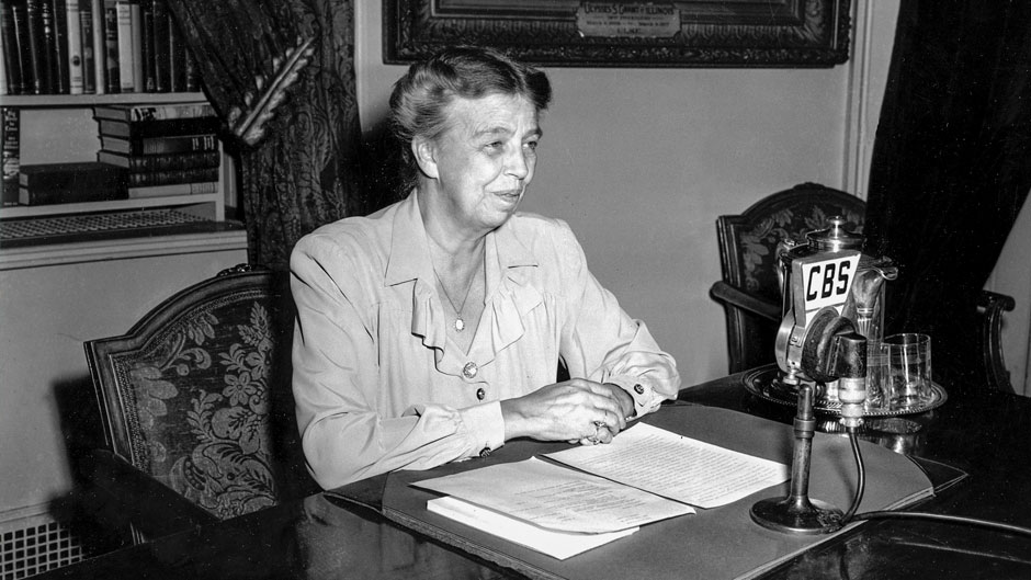 First Lady Eleanor Roosevelt, celebrating her 60th birthday, broadcasts from the White House in Washington, D.C., on Oct. 11, 1944. The first lady is urging attendance at an exhibition of paintings by servicemen, "The Army at War," which will tour the country as part of the upcoming war bond campaign. (AP Photo)