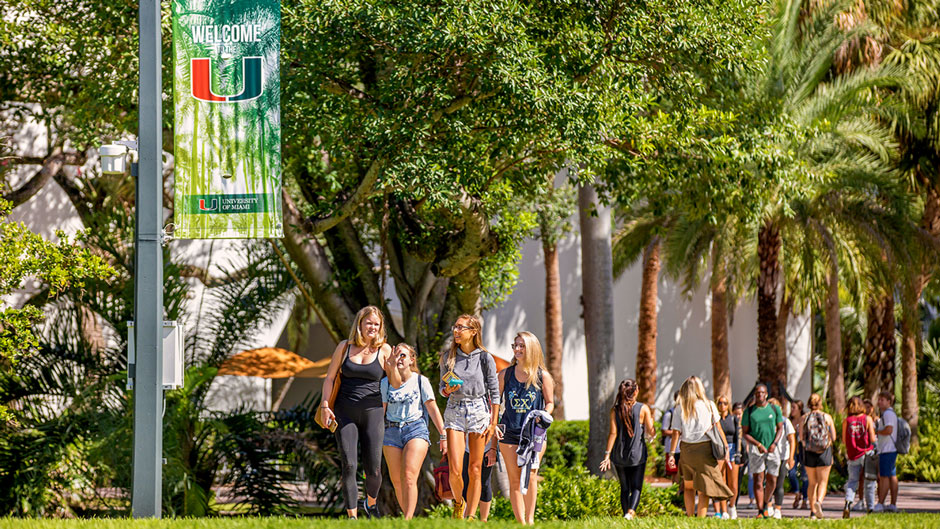 Students walking on the Coral Gables Campus. Photo: TJ Lievonen/University of  Miami