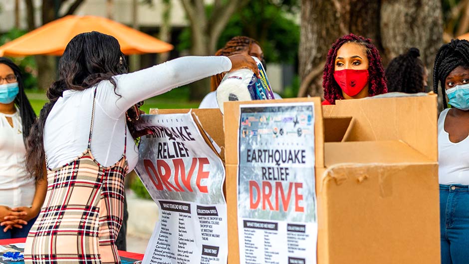 Planet Kreyol hosted a vigil to remember victims of the earthquake. Photo: Jenny Hudak/University of Miami