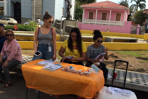 At a community event in Guánica, students distributed information on the environmental and health impacts of PCBs.