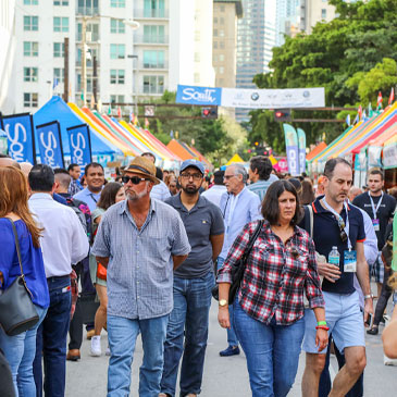 Visitors attend the 2019 Miami Book Fair street fair. Photo: Miami Dade College