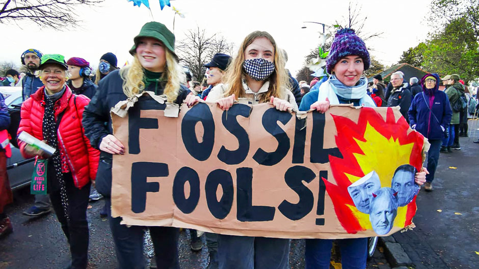 Protesters march at the COP26 summit taking place in Glasgow, Scotland.