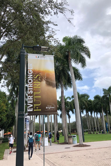 Banners on campus with Ever Brighter campaign themes.