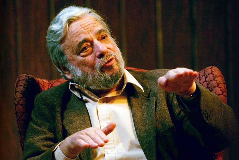 Composer and lyricist Stephen Sondheim gestures during a gathering at Tufts University in Medford, Mass., on April 12, 2004. Sondheim, the songwriter who reshaped the American musical theater in the second half of the 20th century, has died at age 91. (AP Photo/Charles Krupa, File)