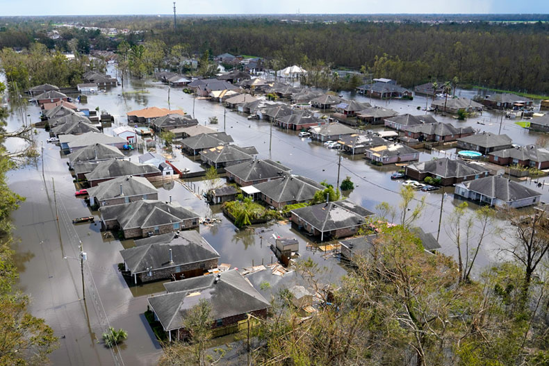 Homes are flooded in the aftermath of Hurricane Ida in LaPlace, La., Tuesday, Aug. 31, 2021. (AP Photo/Gerald Herbert)