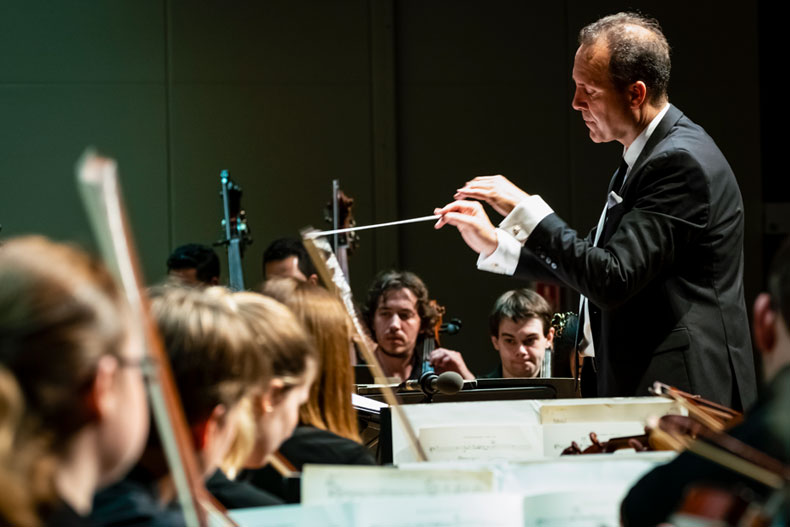 Conductor Scott Flavin, who will be conducting the concert on April 22, photographed with the Henri Mancini Institute Orchestra. Photo courtesy Frost School of Music