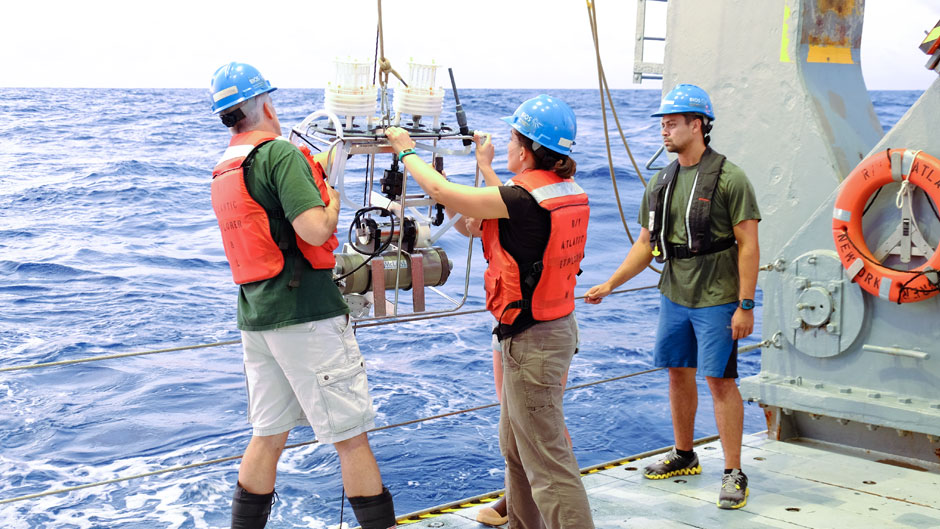 Close deploys a large volume in situ pump into the deep ocean waters of the Sargasso Sea off of Bermuda, along with her research collaborator, Craig Carlson, a professor of marine biology, ecology and evolution at the University of California, Santa Barbara. Photo courtesy of Steve Giovannoni.