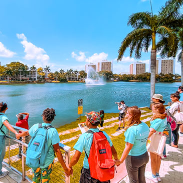 Students surround Lake Osceola in a symbolic hug on Earth Day, April 22, 2022. Photo: Diego Meza-Valdes/University of Miami
