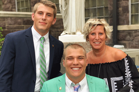 Malesiewski with his brother Adam, left, and mother Halli Reid. Photo courtesy Ian Malesiewski