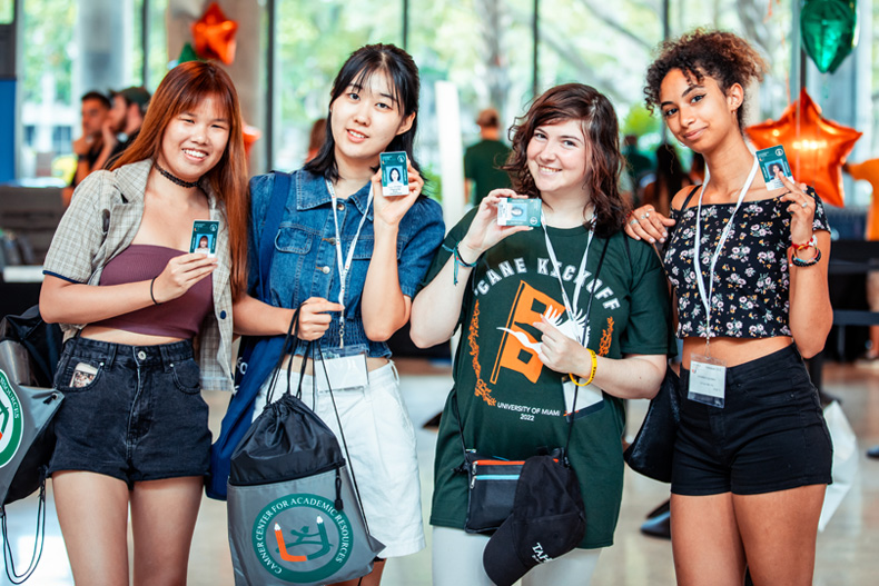 New students pick up their 'Cane Card IDs at check-in on Tuesday, August 16. Photo: Mike Montero/University of Miami