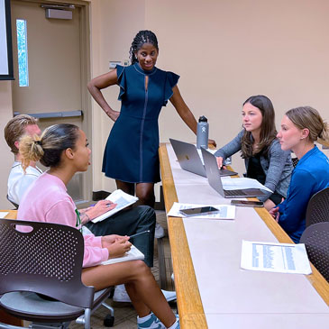 Terri Jackson, executive director of the Women’s National Basketball Players Association, with University of Miami School of Law students in the Women in Professional Sports law course. Photo credit: Greg Levy