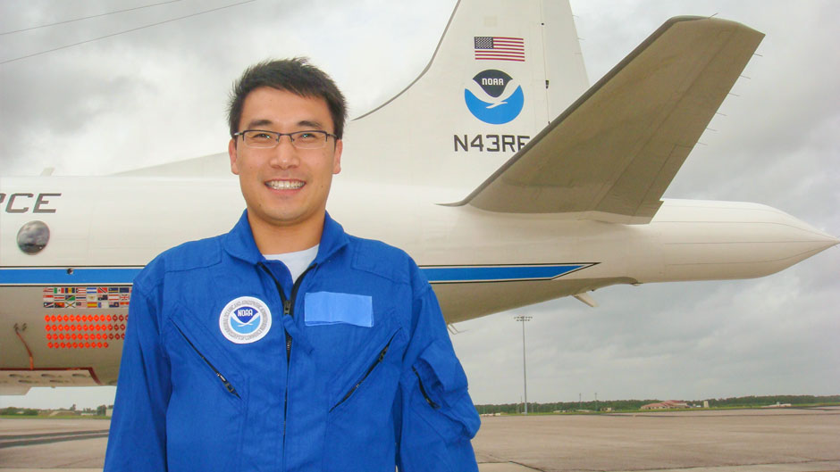 Jun Zhang photographed in front of a Hurricane Hunter aircraft. Photos courtesy NOAA’s Atlantic  Oceanographic and Meteorological Laboratory (AOML)