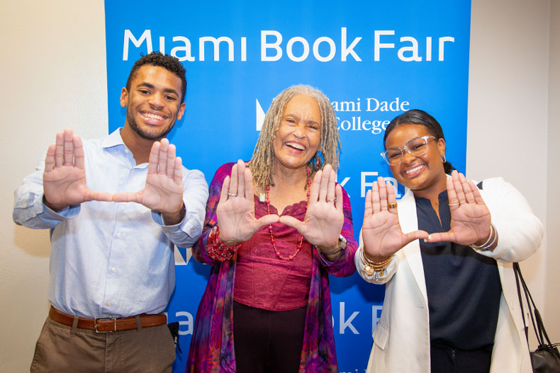  Cutline: Charlayne Hunter-Gault, author of “My People: Five Decades of Writing About Black Lives,” posed with Sterling Cole, a junior from Atlanta studying political science, and Jamie Williams-Smith, president of the Student Government. 