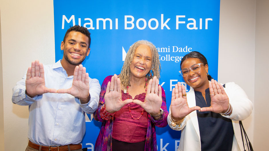  Cutline: Charlayne Hunter-Gault, author of “My People: Five Decades of Writing About Black Lives,” posed with Sterling Cole, a junior from Atlanta studying political science, and Jamie Williams-Smith, president of the Student Government. 