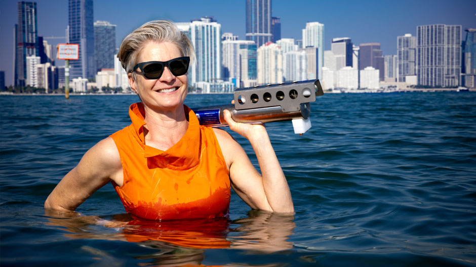 University of Miami professor Lisa Beal poses for a picture in the water off Key Biscayne holding a MicroCAT scientific instrument that measures conductivity, temperature, and pressure of the ocean water. Photo: Joshua Prezant/University of Miami