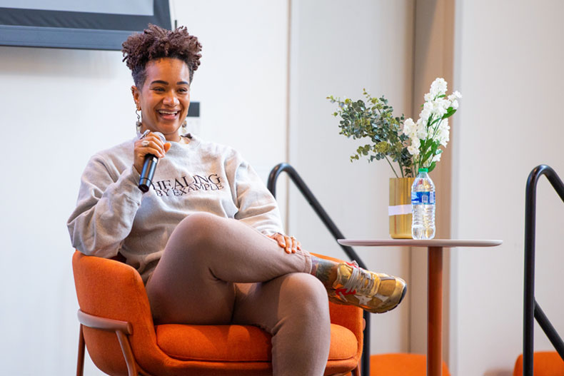 Alex Elle, a New York Times bestselling author and restorative writing teacher, shared her thoughts during the Students of Color Symposium on Saturday about the significance of protecting your mental health and practicing well-being. 