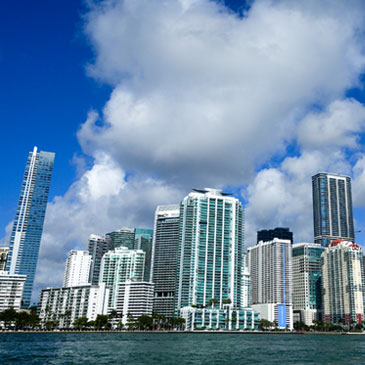 High-rise condominium buildings pack the Brickell neighborhood of Miami, Sunday, Feb. 27, 2022. (AP Photo/Rebecca Blackwell)