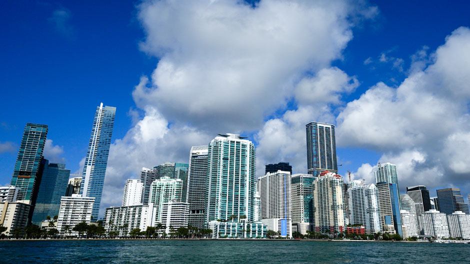 High-rise condominium buildings pack the Brickell neighborhood of Miami, Sunday, Feb. 27, 2022. (AP Photo/Rebecca Blackwell)