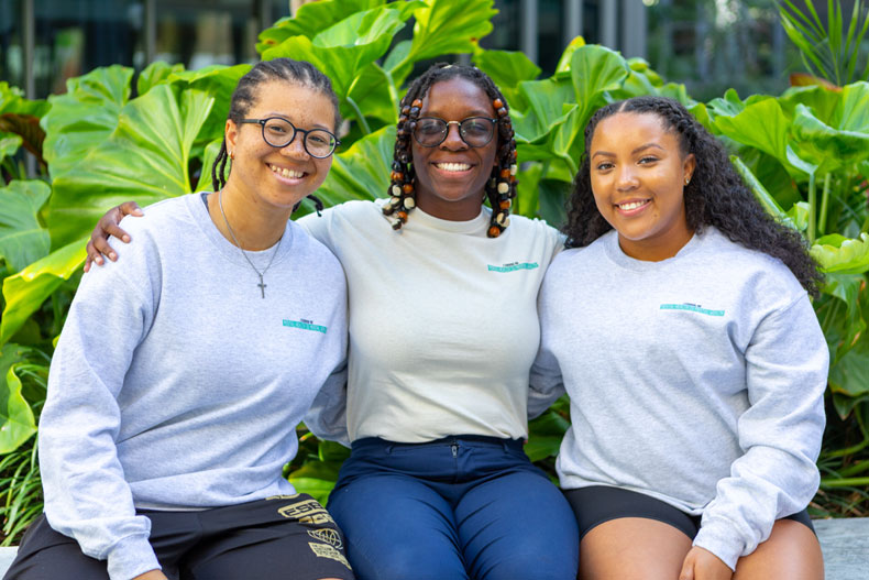 From left; Alexis Owens, Cassandra Michel, and Zoe Major, members of the Students of Color Symposium planning committee. 