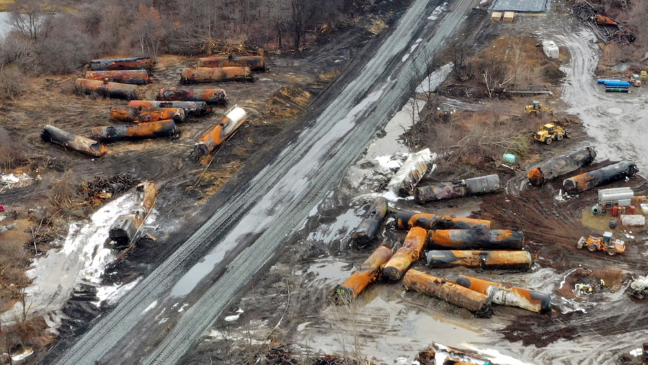 This photo taken with a drone shows the continuing cleanup of portions of a Norfolk Southern freight train that derailed Friday night in East Palestine, Ohio, Thursday, Feb. 9, 2023. (AP Photo/Gene J. Puskar)