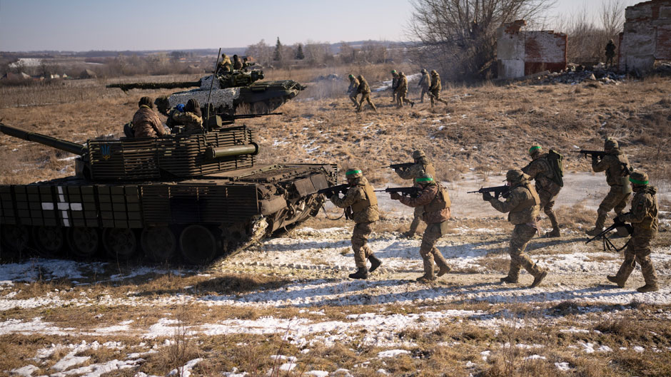 Ukrainian servicemen of the 3rd Separate Tank Iron Brigde take part in an exercise in the Kharkiv area, Ukraine, Thursday, Feb. 23, 2023, the day before the one year mark since the war began. War has been a catastrophe for Ukraine and a crisis for the globe and the world is a more unstable and fearful place since Russia invaded its neighbor on Feb. 24, 2022. (AP Photo/Vadim Ghirda)
