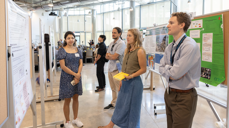 Ph.D. biology student Lina Aragón presents her team’s research on the way in which climate change will increase the frequency of heat stress on urban tree life. Photo: Joshua Prezant/University of Miami