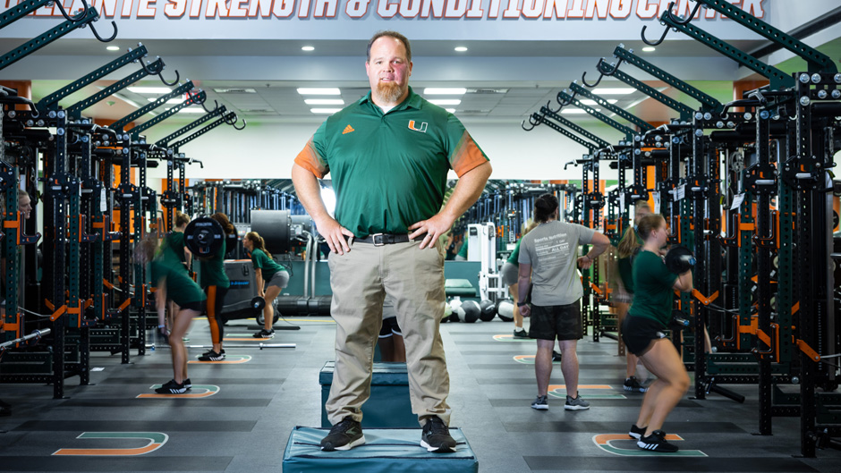 Photo by Joshua Prezant/University of Miami-- J.Bryan Mann, a Kinesiology professor who works with Athletics using the velocity based training on students, poses for a picture at the Squillante Strength & Conditioning Center.
