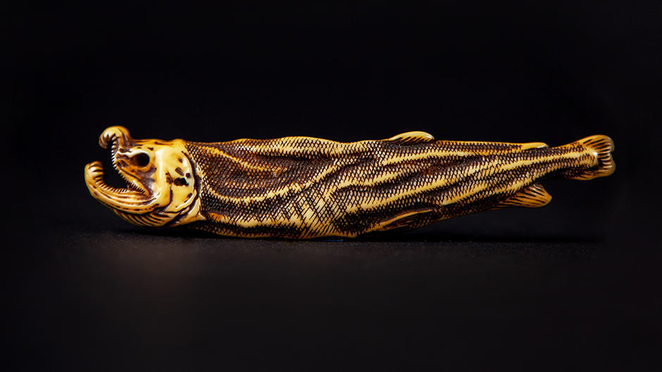 Netsuke of a fish from the collection of Dr. Joseph and Elena Kurstin. Photo by Mariana Espindola and Alyssa Wood