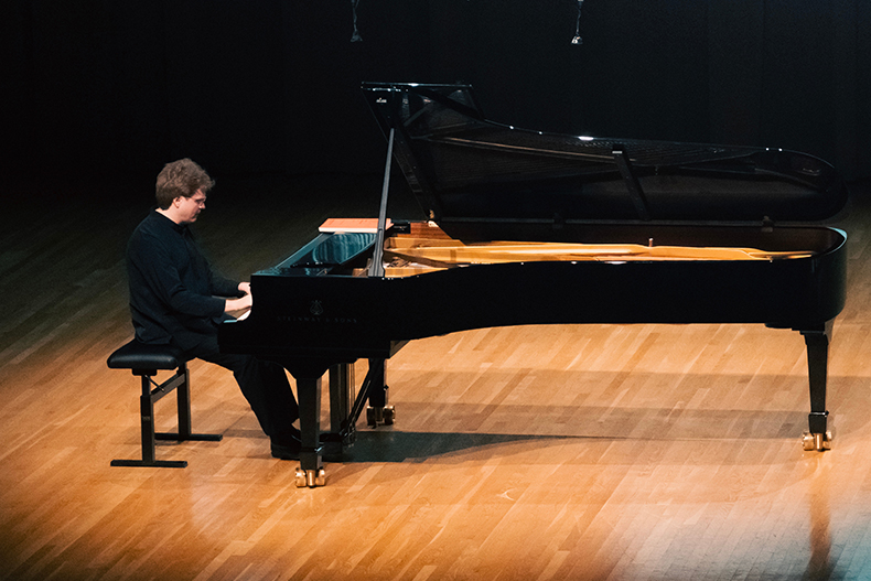 Pianist Dmitry Ablogin performs at the Maurice Gusman Concert Hall during the fifth annual Frost Chopin Festival.