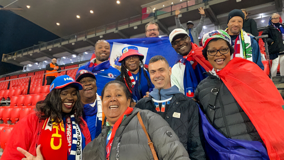 Professor MarieGuerda Nicolas traveled to Australia with her daughters and joined hundreds of other fans cheering for Les Grenadieres during its run in the soccer tournament. 