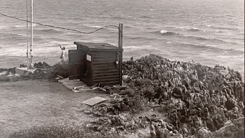 The Barbados Atmospheric Chemistry Observatory as it was in its early days. Back then, a wooden shack housed the instruments scientists used to analyze samples collected from the 55-foot tower.  Photo courtesy of BACO